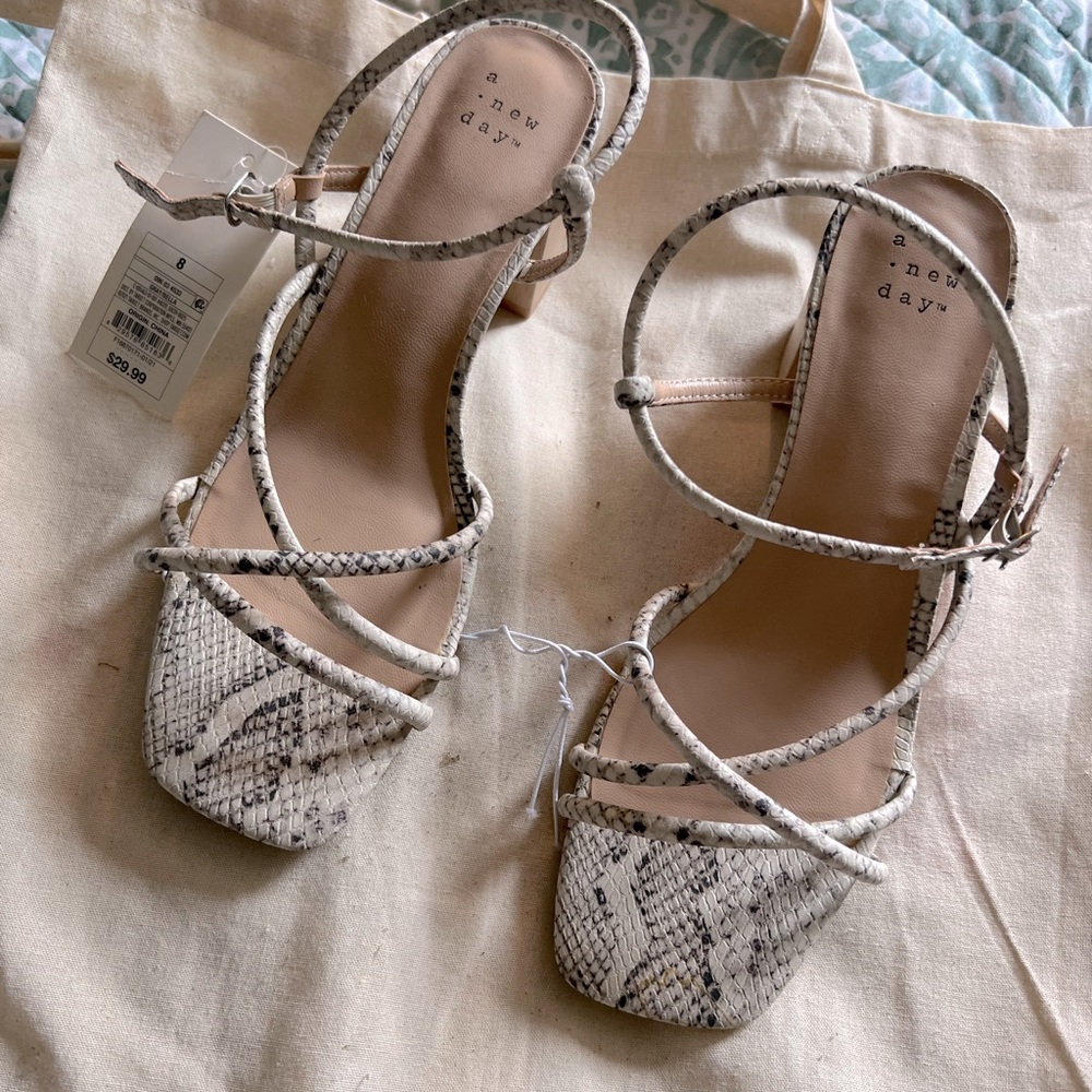 Brand new snake print low heels
